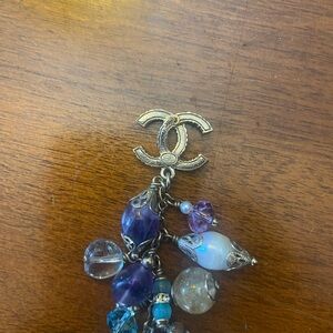 CHANEL Gold and Purple Brooch with Charms